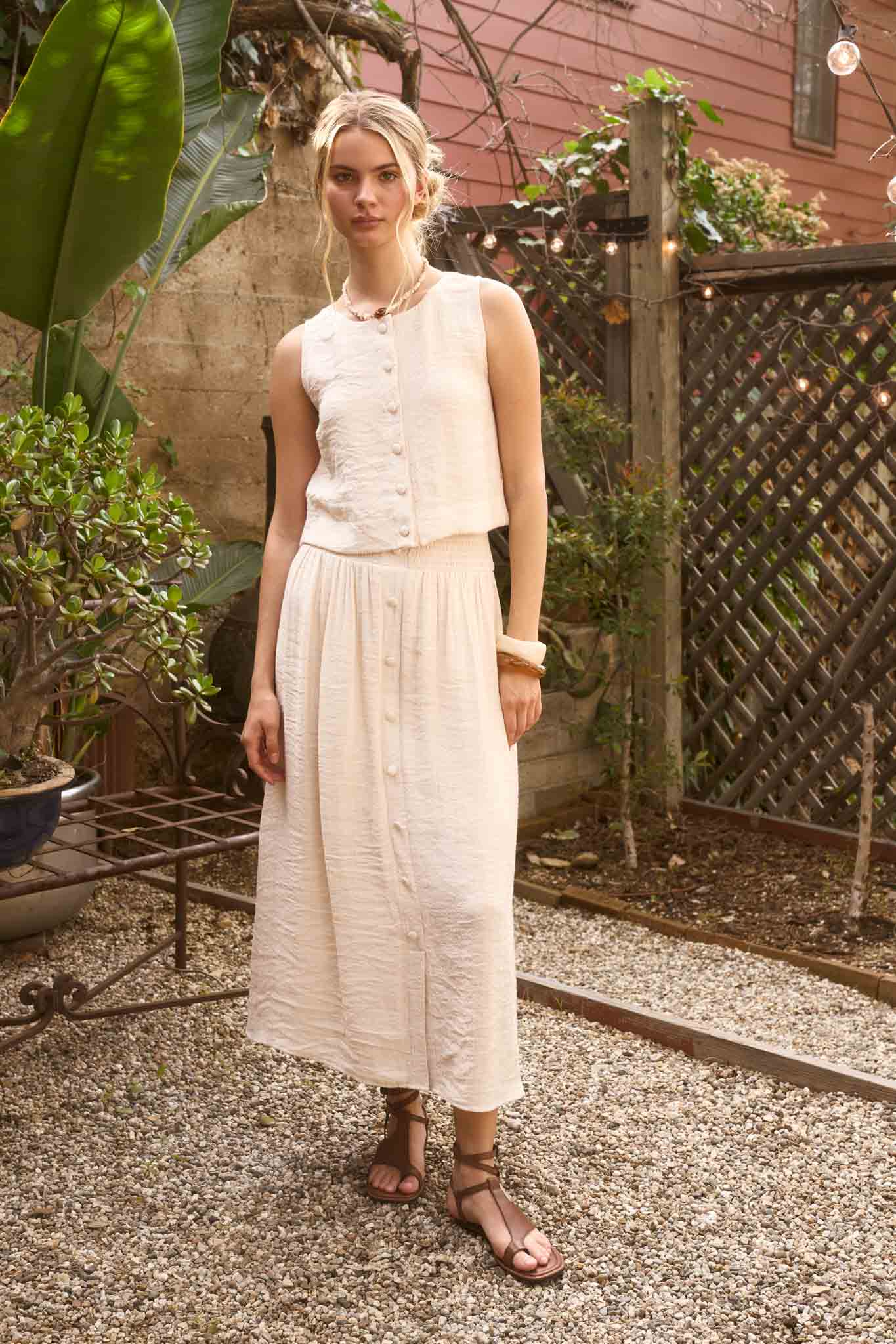 SMOCKED WAIST RUFFLE DETAIL BUTTON DOWN MIDI SKIRT: NATURAL